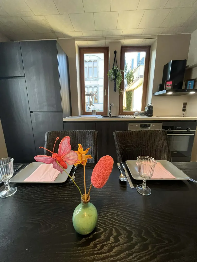 Table set with flowers in the poolhouse kitchen